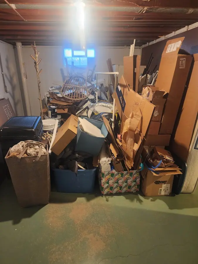 Roll-off dumpster container at job site for Yard Waste Dumpster Rental in Park City